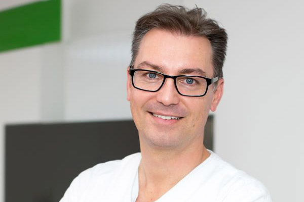 Dr. med. dent. Dirk R. Grünewald, M.Sc. M.Sc.